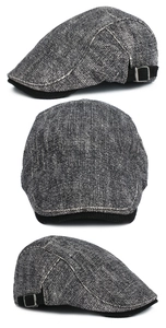 Detailed view of tweed ivy cap with corduroy brim and adjustable metal buckle
