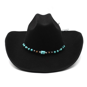 Detail of western wool fedora featuring turquoise ethnic band and rolled wide brim