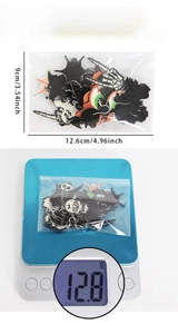 Halloween jewelry set weight and dimension display with bat and skull designs