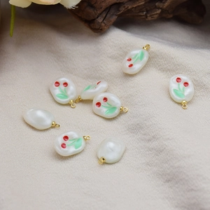 Handmade cherry resin oval pendants with gold hooks for DIY jewelry making and crafts