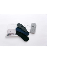Flat lay of five cotton invisible socks in black, grey, navy and white colors