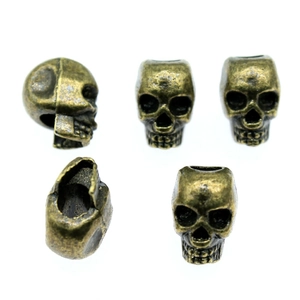 Perles tête de mort en bronze antique pour tresses et bracelets sous plusieurs angles