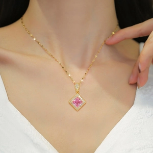 Titanium steel necklace with pink rhombus pendant and white diamonds on female model