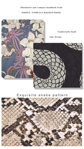 Close-up of vintage floral print and snake pattern texture on compact men's bifold wallet