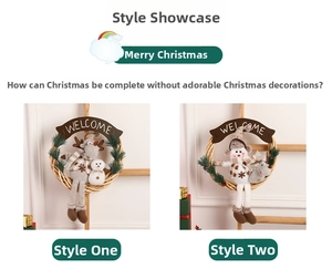 Detail of Christmas rattan wreaths with reindeer, snowman dolls and a Welcome wooden sign