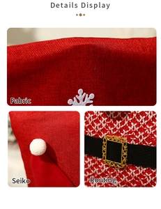 Detail view of red burlap fabric, white snowflake applique and golden buckle on chair cover