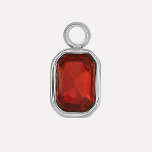 Detailed close-up of a 304 stainless steel pendant with emerald-cut red crystal