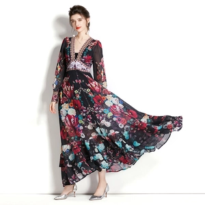 Vintage floral maxi dress with deep V-neck, lantern sleeves and ethnic embroidery accents