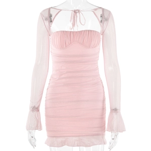 Detail of pink mesh mini dress featuring tiered ruffles and elegant flared sleeves