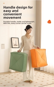 Detail of square tatami floor cushion with convenient handle and cross-stitch craft
