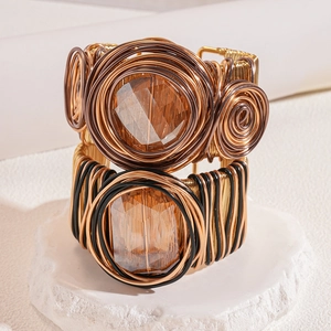 Exaggerated braided metal wire open bangle with amber glass stone in bohemian style