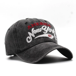 Detailed embroidery of America and New York text on washed grey baseball cap