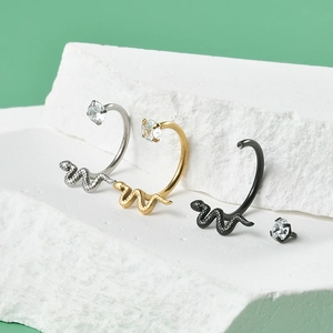 Punk snake horseshoe lip studs in silver, gold, and black with zircon stones and threads
