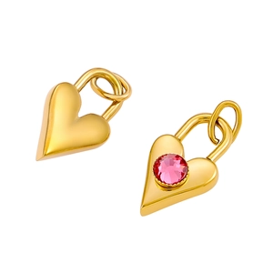Detailed view of two gold heart lock pendants featuring a pink zircon stone inlay