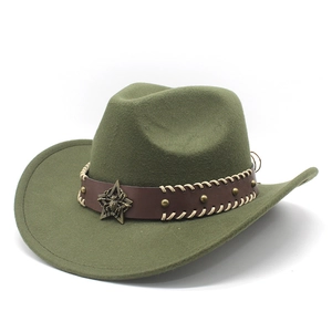 Detail of olive green felt cowboy hat featuring leather band and metal star badge