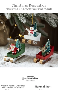 Close-up of Nordic iron Christmas sled ornaments featuring snowman and reindeer designs