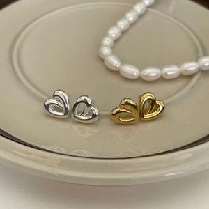 Elegant 925 sterling silver hollow heart hoop earrings in gold and silver finish