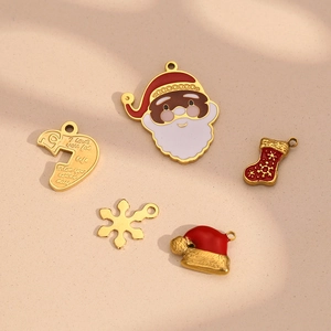 5-piece 18K gold plated Christmas charms set with Santa, snowflake, and heart pendant