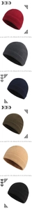 Multiple colors of fleece cycling caps showing soft texture and thermal ear protection