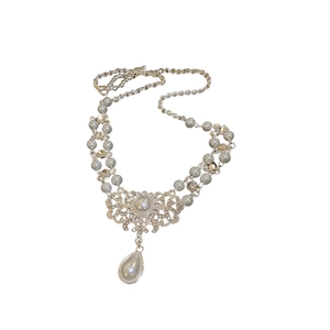 Baroque water drop pearl necklace with silver flower design for a vintage palace style