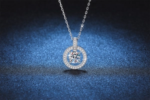 Macro detail of S925 silver round pendant necklace with 1 carat brilliant moissanite stone