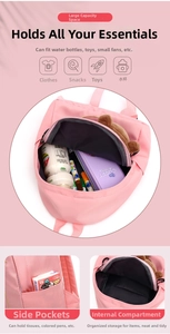Detail view of pink preschool backpack showing large capacity main pocket and side pockets
