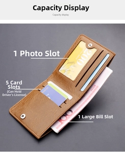 Close-up of brown bifold leather wallet showing card slots and ID window with button