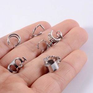 Set of stainless steel cuff earrings in various styles including hollow and leaf patterns