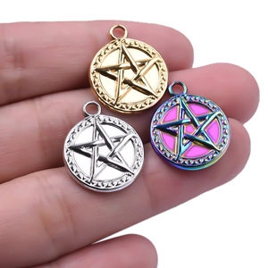 Three 304 stainless steel star pendants in gold, silver, and rainbow colors held in hand