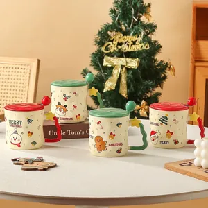 Christmas ceramic mug set with lid and spoon featuring festive graffiti patterns