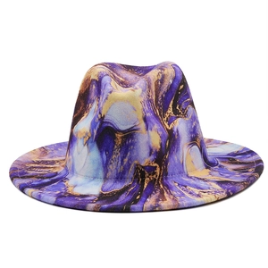 Detail of fedora hat with marble print in purple, blue and gold color patterns