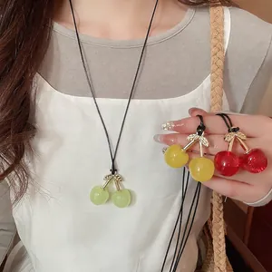 Charming cherry pendant necklace with colorful translucent beads and gold leaf charms