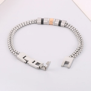 Bracelet pour homme en acier inoxydable argenté avec anneaux décoratifs noirs et dorés