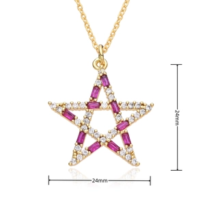 Detail showing the 24mm x 24mm star pendant with red gemstones and white crystals