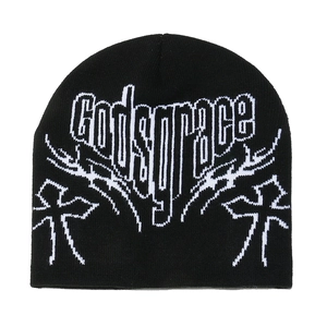 Detailed view of the Godsgrace gothic lettering and cross jacquard on a black beanie