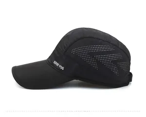 Detail of breathable laser-cut side mesh on black quick-dry sports baseball cap