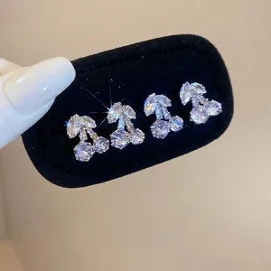 Elegant cherry stud earrings set with sparkling cubic zirconia on silver-plated pins