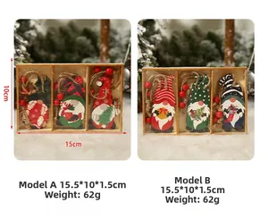 Macro detail of painted wooden Christmas gnome pendants with rustic jute hanging ropes