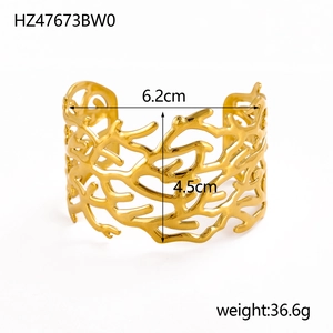 Detailed view of golden coral-textured cutout cuff bracelet with dimensions and weight