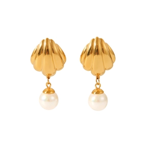 Detail of 18K gold shell earrings with white pearl pendants against a clean white background