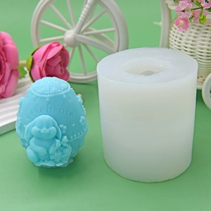 Cylindrical silicone mold for DIY baking with blue egg-shaped rabbit relief pattern