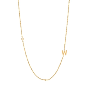 Detailed view of S925 sterling silver golden letter W necklace with small diamond pendants