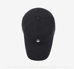 Top down view of black baseball cap with sports logo and structured six-panel crown