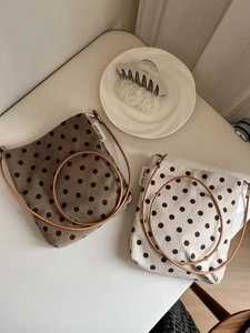 Polka dot corduroy crossbody bags with leather straps and simple wish woven labels