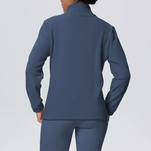 Detailed back view of navy blue fleece tracksuit featuring high collar and soft texture