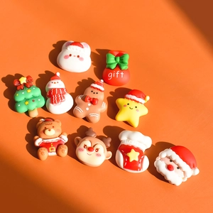Set of 10 Christmas resin charms featuring Santa, reindeer, and tree for DIY crafts