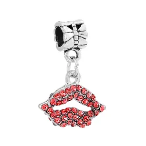 Detailed view of silver charm bead with red rhinestone lips pendant for DIY bracelets
