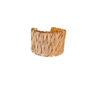 Elegant gold twisted metal open bangle with woven texture design on a white background
