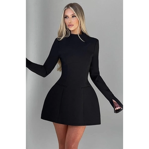 Detail view of black long sleeve dress featuring slit cuffs and slim fit waistline design