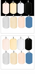 Detailed view of blank stainless steel dog tags in multi-color finishes and textures